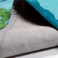 THEKO die markenteppiche Tapis enfant Honolulu - Tissu - Turquoise - 100 x 160 cm -Tapis Soldes Boutique 1000174697 190715 16133100014 DETAILS P000000001000174697