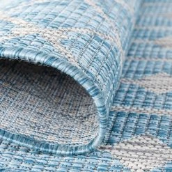 Top Square Tapis intérieur / ext. Cloud Crosses III - Polypropylène - Turquoise - 185 x 275 cm 17 Top Square Tapis intérieur / ext. Cloud Crosses III - Polypropylène - Turquoise - 185 x 275 cm -Tapis Soldes Boutique 1000284818 210819 13564301281 DETAILS P000000001000284818