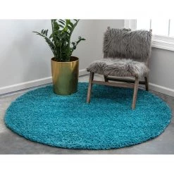 Top Square Tapis épais Shaggy Shag II - Polypropylène / Coton - Turquoise - Diamètre : 120 cm 14 Top Square Tapis épais Shaggy Shag II - Polypropylène / Coton - Turquoise - Diamètre : 120 cm -Tapis Soldes Boutique 1000285001 210819 14411104389 MOOD DETAILS P000000001000285001 mood