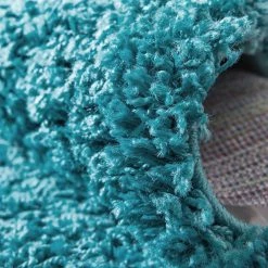 Top Square Tapis épais Shaggy Shag II - Polypropylène / Coton - Turquoise - Diamètre : 120 cm 16 Top Square Tapis épais Shaggy Shag II - Polypropylène / Coton - Turquoise - Diamètre : 120 cm -Tapis Soldes Boutique 1000285001 210819 14411204392 DETAILS P000000001000285001