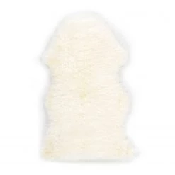 THEKO die markenteppiche Tapis en peau Maeh - Fourrure d’agneau - Crème - 100 x 68 cm